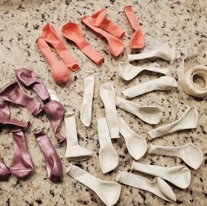 Pink, white, and purple balloons with sticky Balloon dots